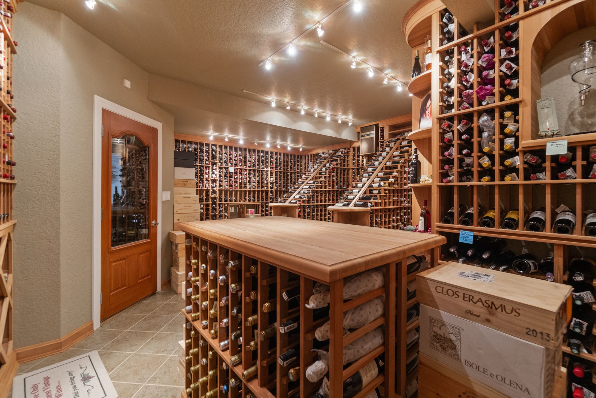 Calling all Wine Enthusiasts. This Custom Built Home has the Wine Cellar of Your Dreams!
